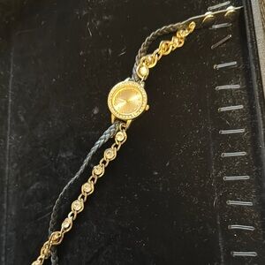 Elegant Gold and Black Bracelet